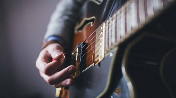 Easy Guitar Chords and Songs to Master Them